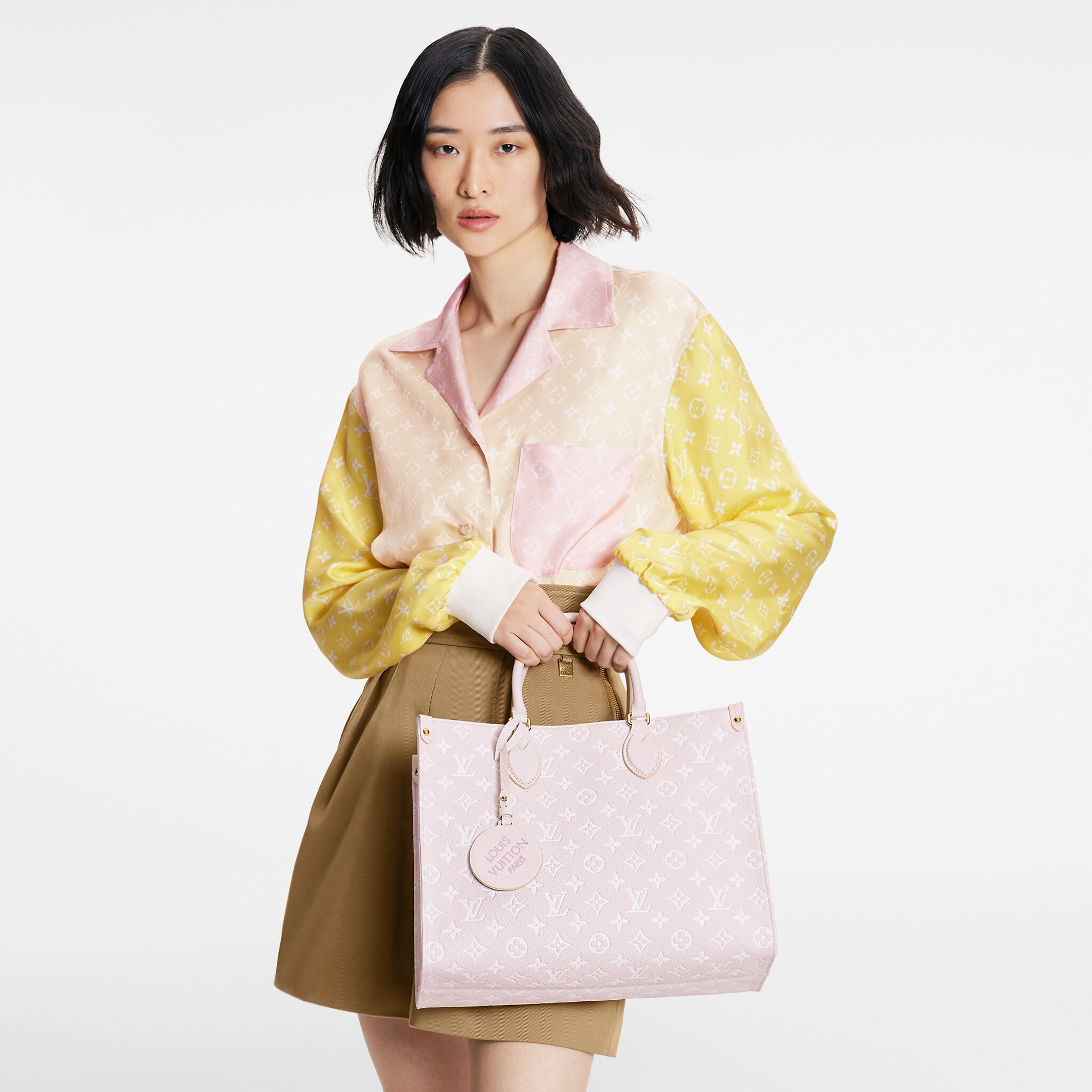 路易威登-onthego-中号手袋-monogram-empreinte-时尚手袋-M46128_PM1_Worn-view.jpg
